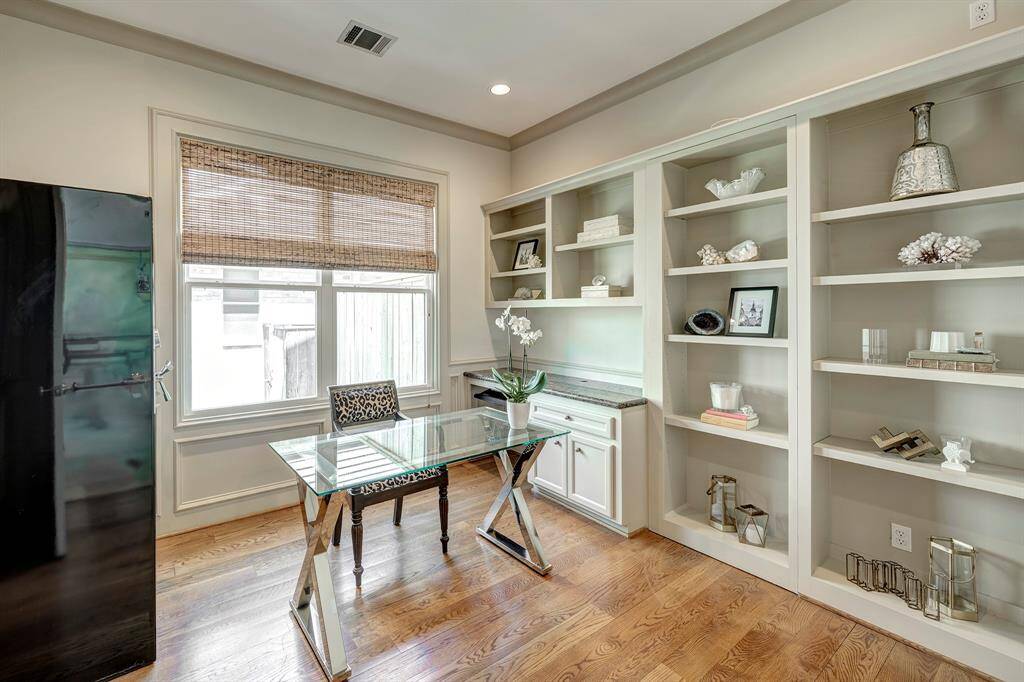 Office downstairs with an extra closet and secret door to the primary