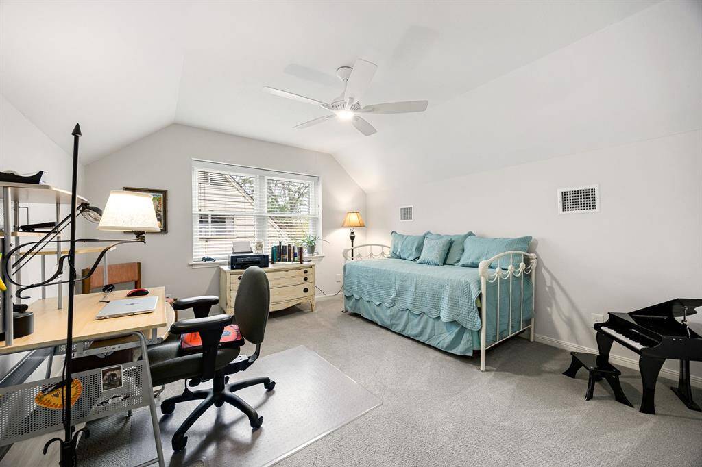 This cozy upstairs bedroom is filled with natural light and features raised ceiling and reach-in closet. Its quiet location provides a peaceful place to relax, rejuvenate or rest.