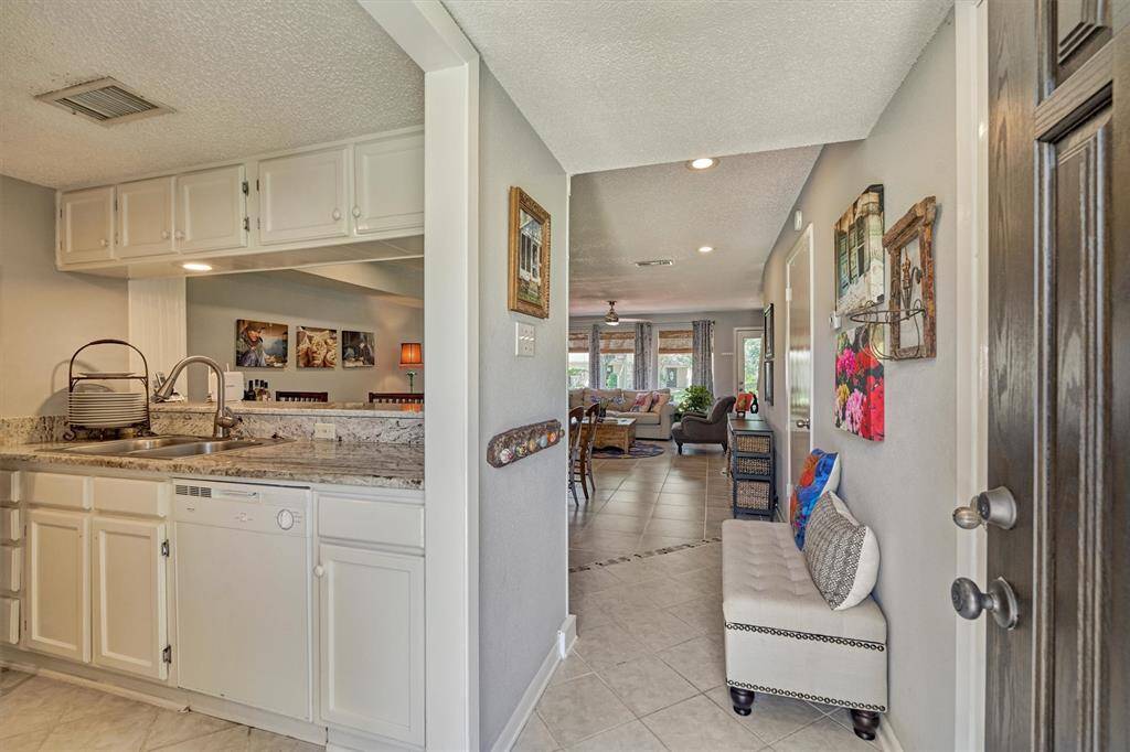 Immaculately-cared for home with structural improvements in primary bedroom, living and half bath!