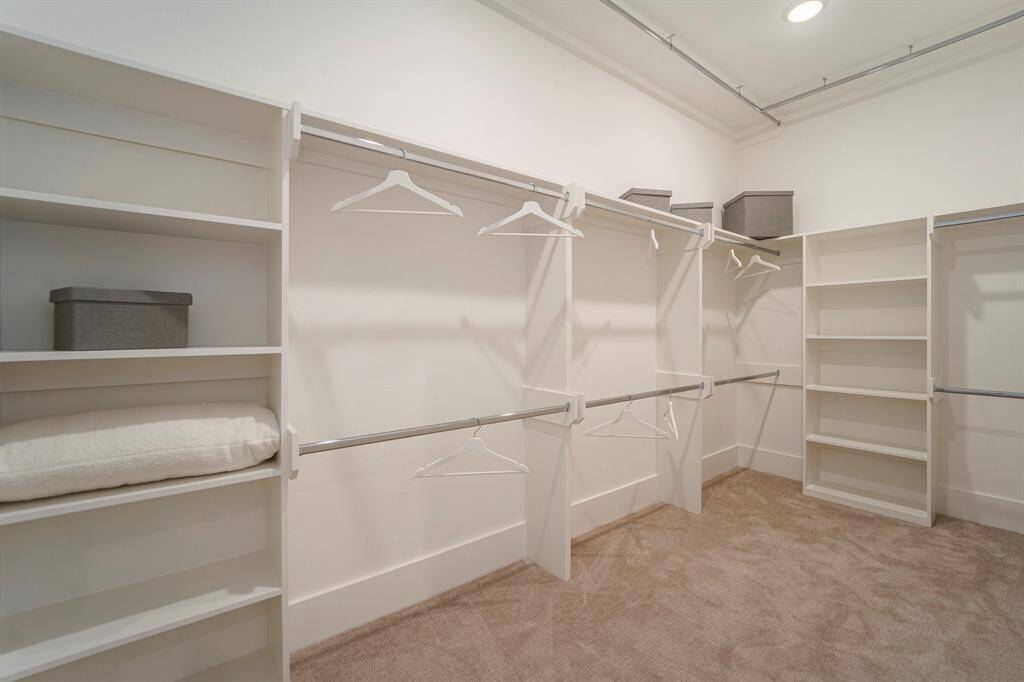Primary Closet. Triple Rod System.
