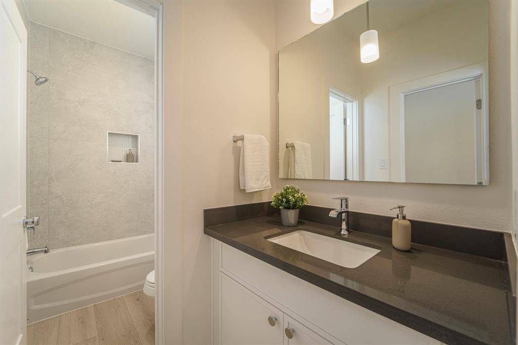 Second Full Bath. Model Home. Finishes of home may vary.