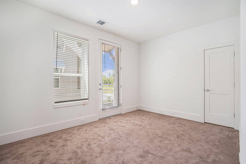 Secondary Bedroom. Model Home. Finishes of home may vary.