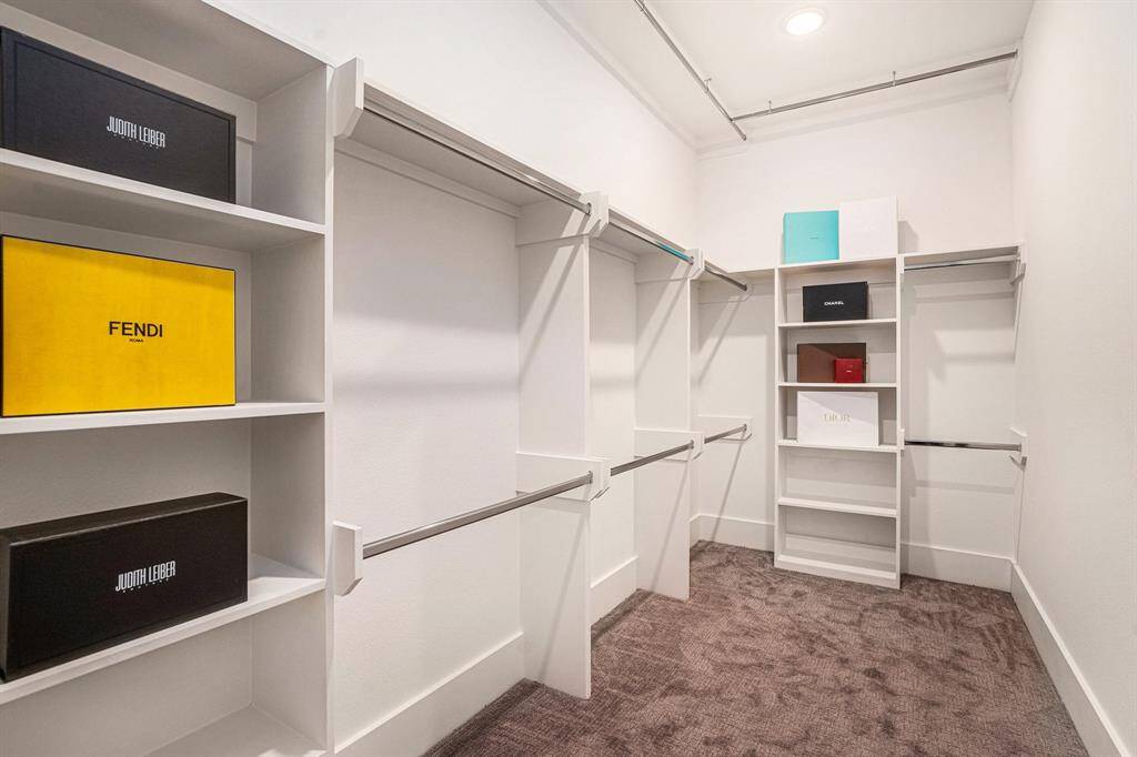 Primary Closet. Triple Rod System.