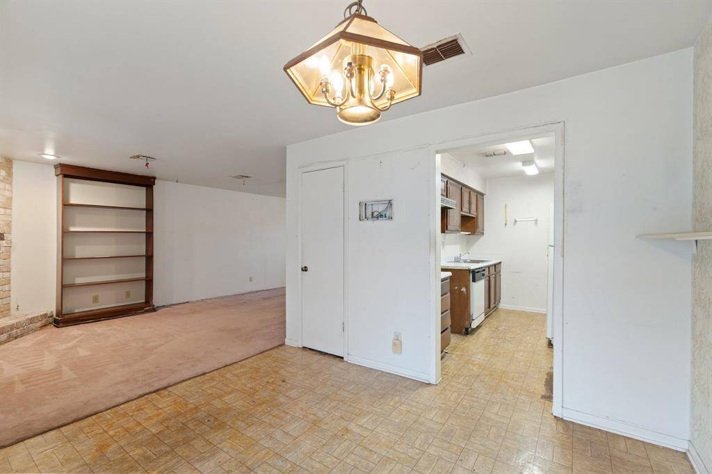 Seamless Flow to the Kitchen! A view from the living room, with the kitchen conveniently located on the right.