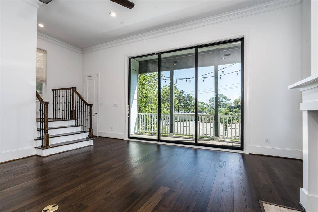 Beside the sliding glass door there is a large closet, which is designed to be an elevator shaft if you would like to add one.