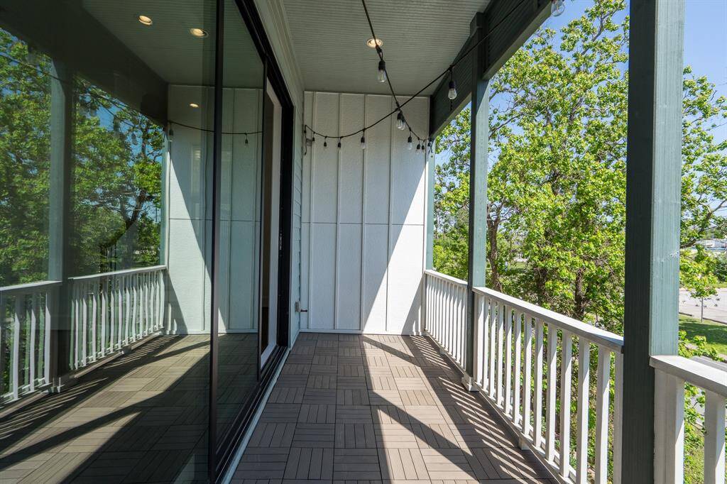 This home has two outdoor spots, the front porch and this lovely balcony.