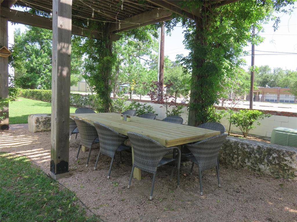 the courtyard closest to the home now has a community dining table accessible to all that seats 12 and is used for family gatherings, parties and special events.