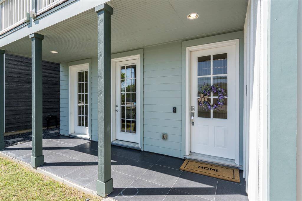 The front porch welcomes your guest as well as provides a wonderful place to add some chairs to enjoy the outdoors.