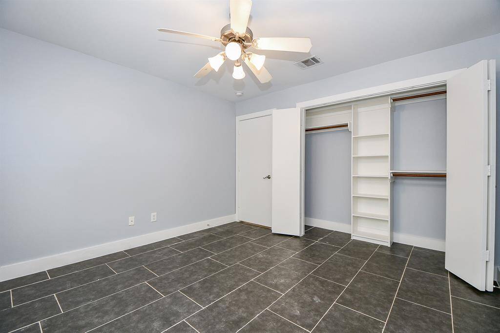 Check out the built in shelving in this secondary room closet