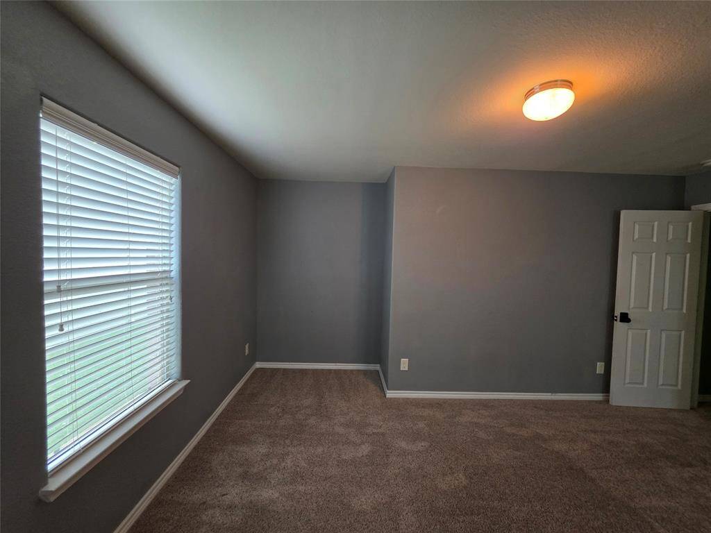 Extra space for a lounge chair in the Primary Bedroom