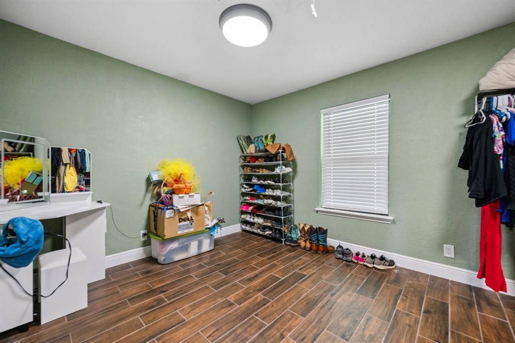 This shows a portion of the walk-in closet! It could truly be an office or nursery.