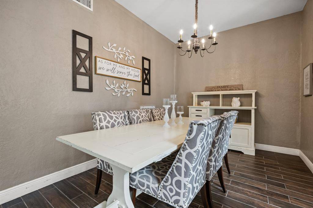 Cozy dining room is right off the kitchen and the living room