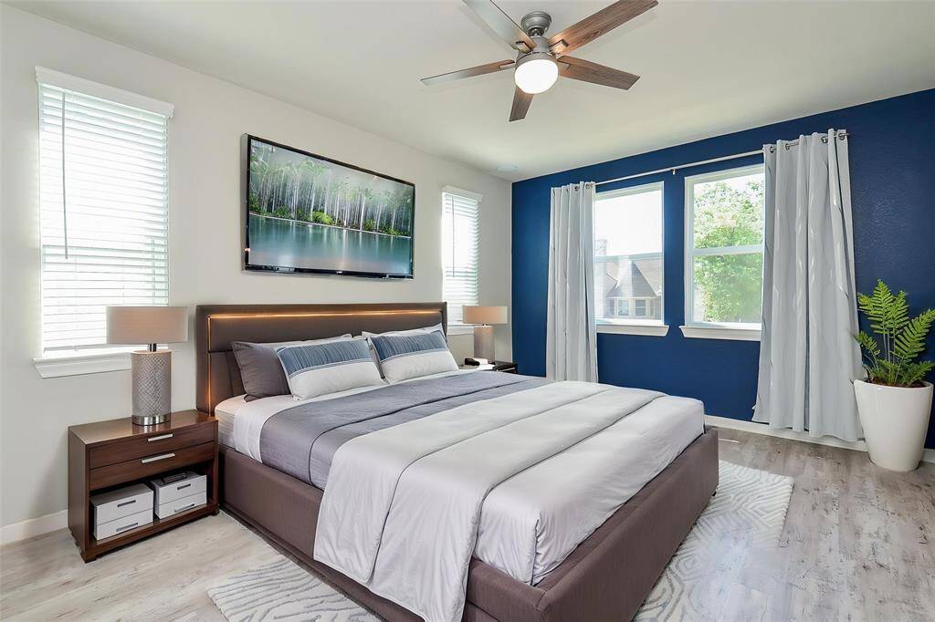 Experience this stylish and serene bedroom.