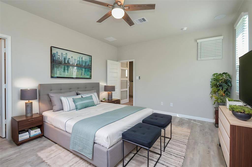 Imagine the comfort provided by the ceiling fan, ensuring pleasant atmosphere year-round. The stylish wood-like flooring provides easy maintenance as well.