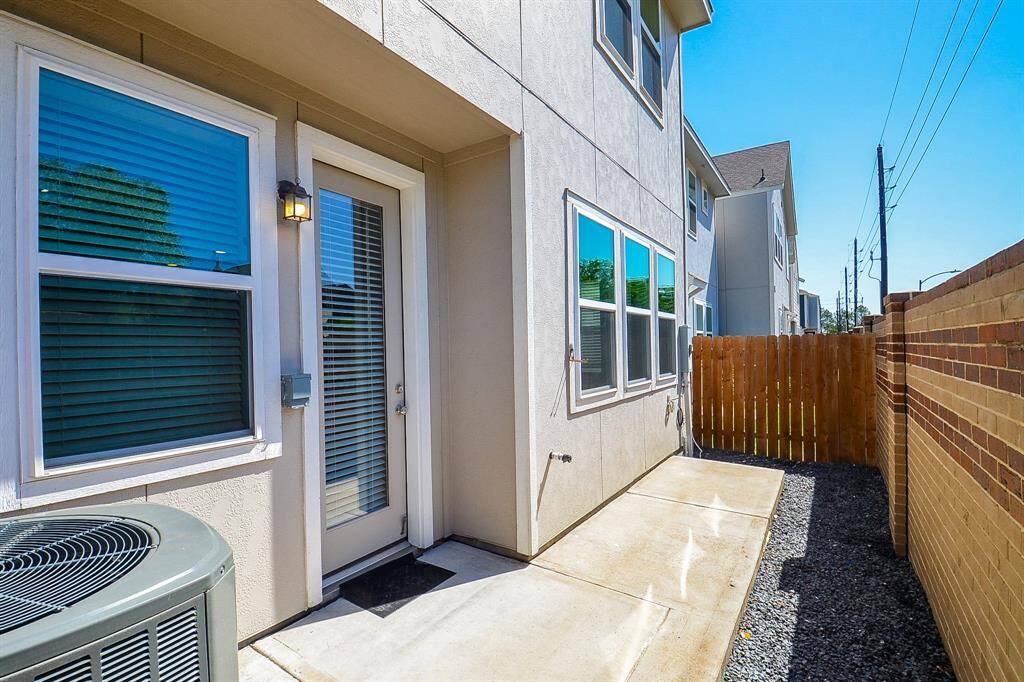 Enjoy the ease of indoor-outdoor living with this home's convenient access to a private outdoor space.