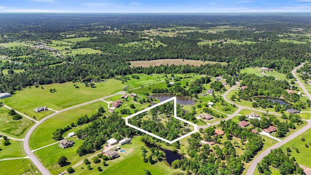 Enjoy the serenity of rural living while still being within reach of modern convenience. Lot lines shown are estimated and should be independently verified.