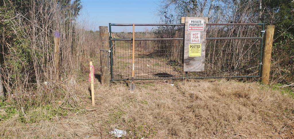NEW FRONT ACCESS GATE WILL BE TO THE LEFT OF THIS ONE THAT BELONGS TO THE NEIGHBOR