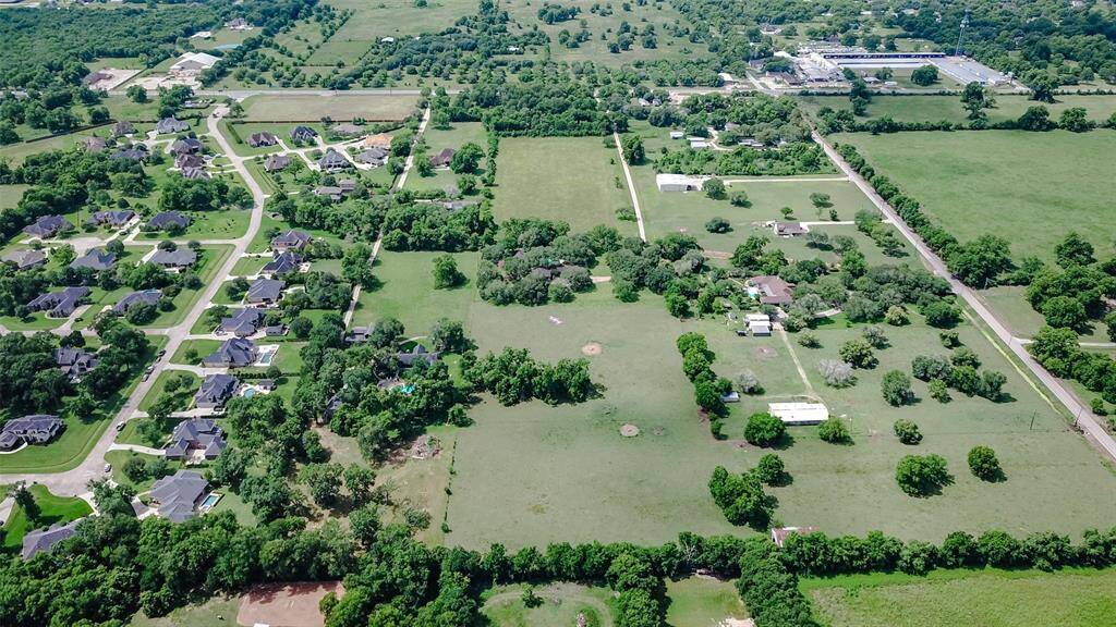In addition to the two parcels, there is extra acreage available, including three parcels totaling 7.562 acres, plus an additional 2.734-acre parcel featuring a home, pool, and shop.