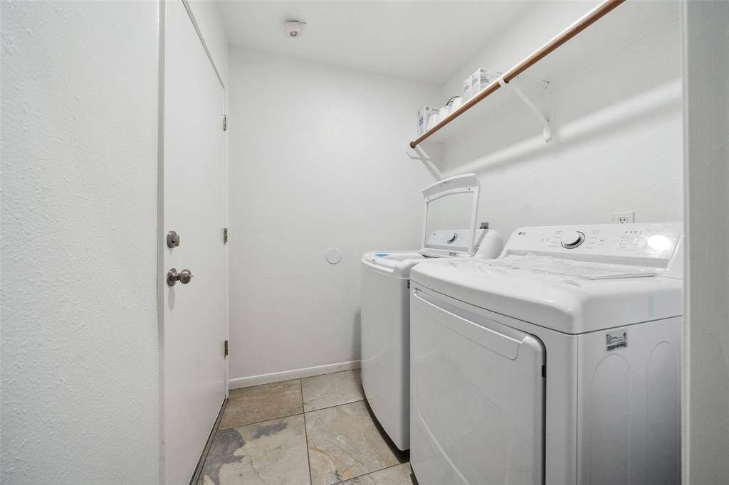 Large laundry leading from garage