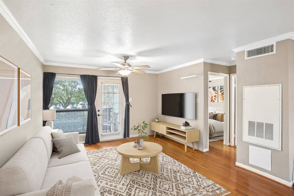 Living area is staged to help envision in making it your own