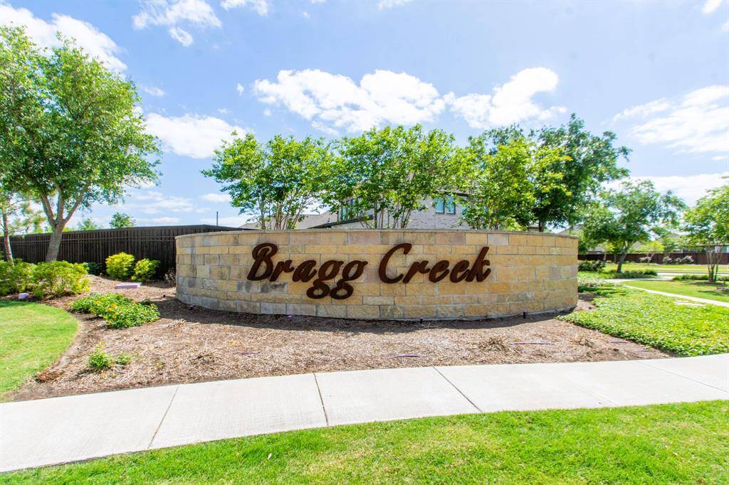 Entrance to Bragg Creek, a quiet section of Meridiana. This presents a welcoming and attractive neighborhood entrance.