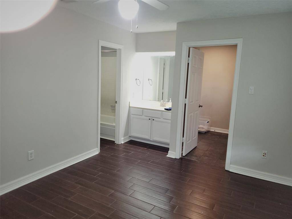 Front bedroom has built in vanity and connects to hollywood bath