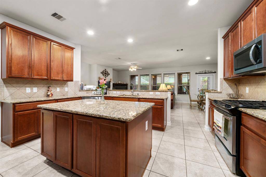 The cabinets have slide out trays for easy access to pots, pans and cookware