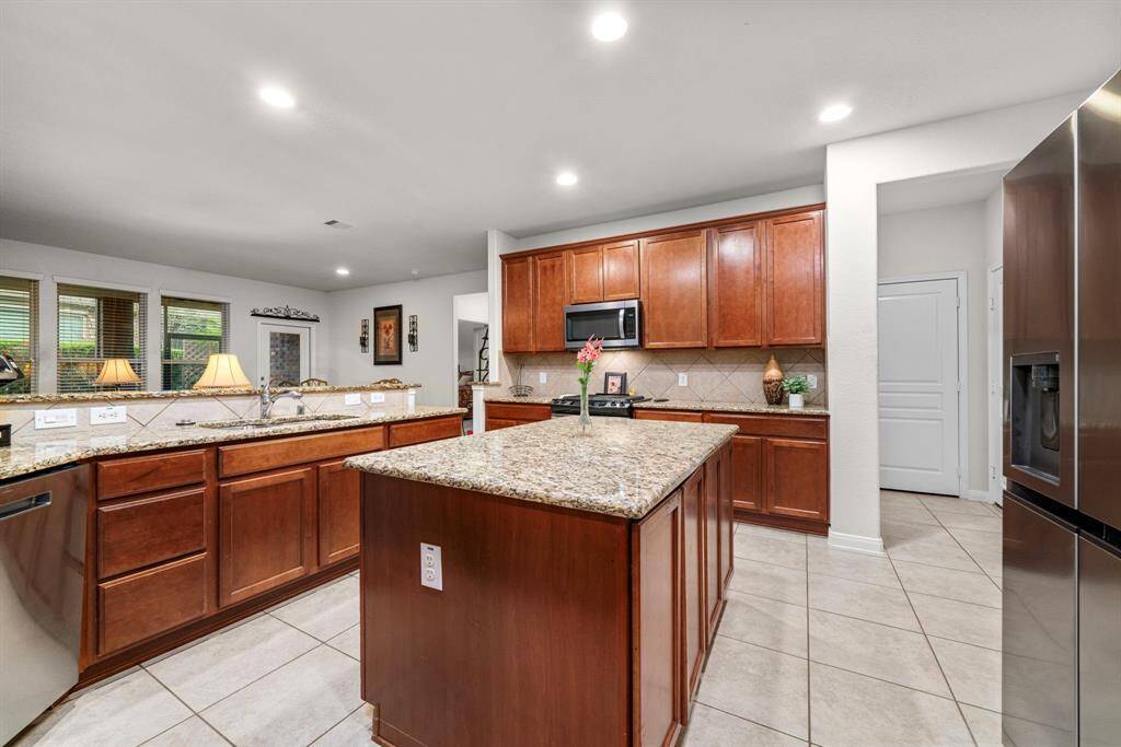 The kitchen island provides for additional counter workspace
