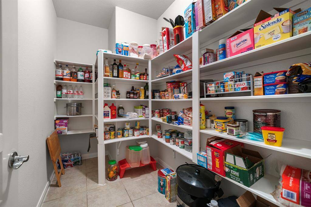 A very large walk-in pantry to store items