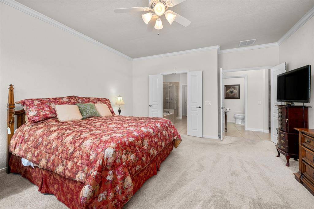 Primary bedroom is designed for flexibility for bedroom furniture placement