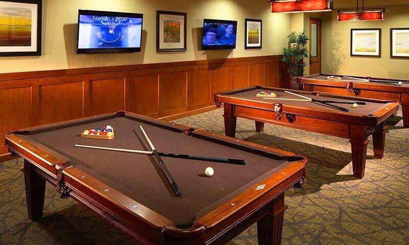 Billiards tables for a variety of games