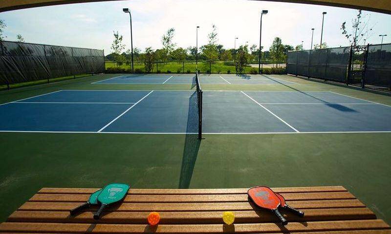 Four lit pickleball courts