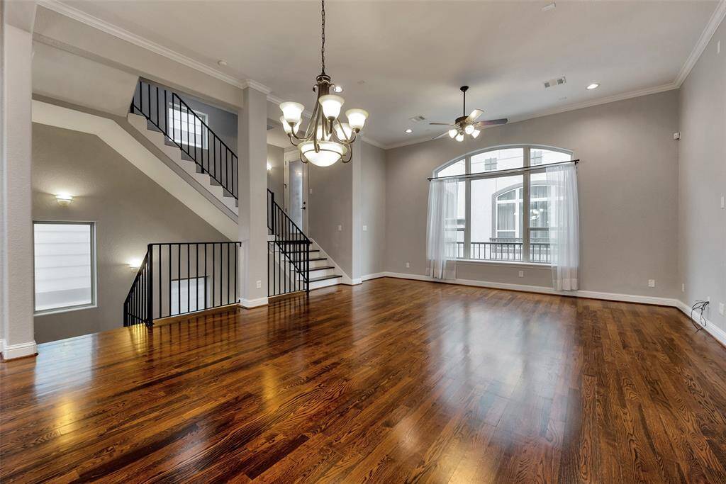 Gorgeous hardwood floors, high ceiling, and a large window that brings in ample natural light are the highlights that make this an amazing space to live and entertain well.