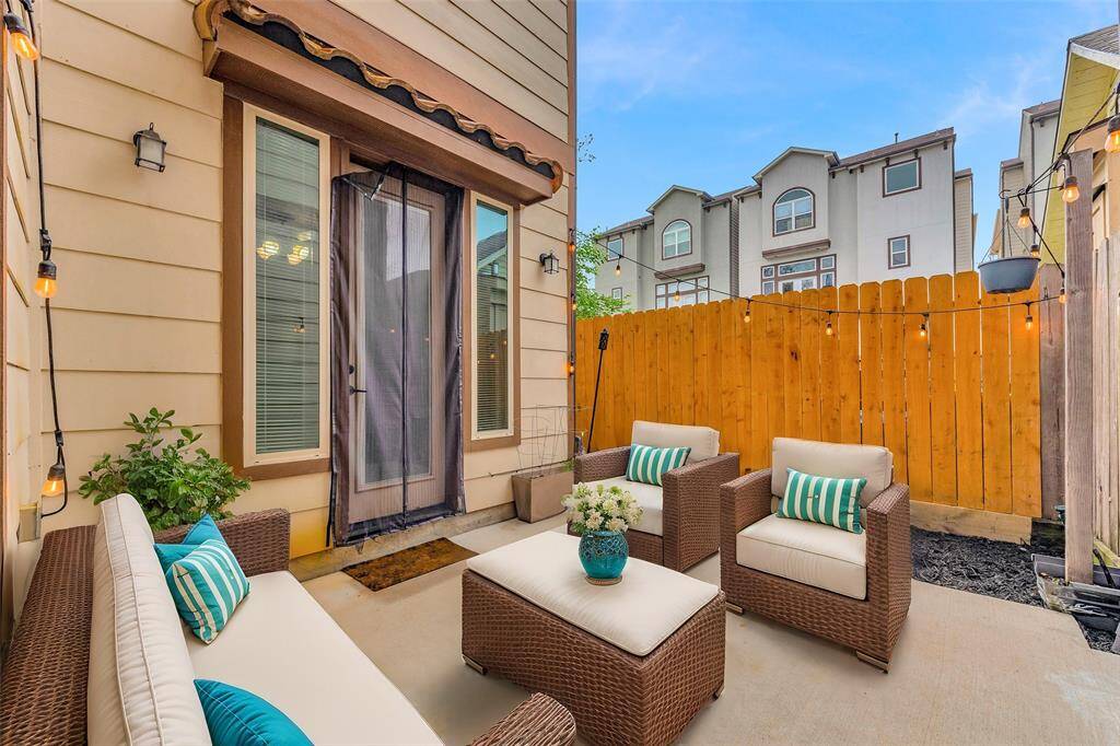 The owners built the concrete patio and added turf to make this yard a great area to enjoy the outdoors and entertain.