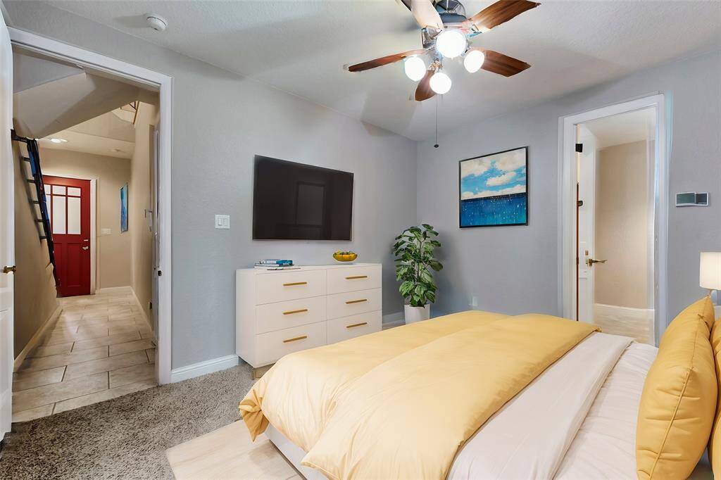 The first floor bedroom (one of three) is spacious with a nice-sized ensuite bath and a walk-in closet.