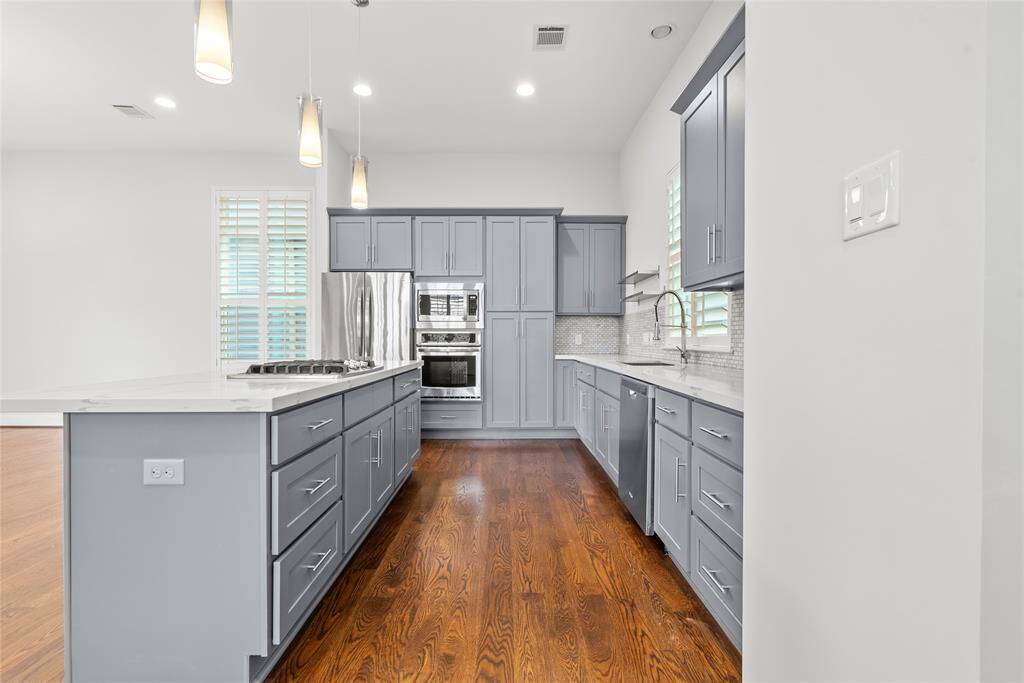 A True Chef's Kitchen with a large island and plenty of counterspace.