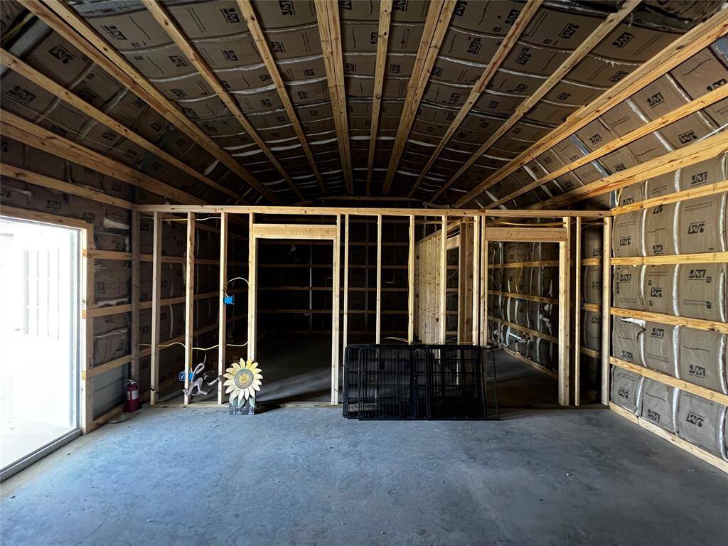 Inside barndominium. Framing, plumbing, and electrical is done.