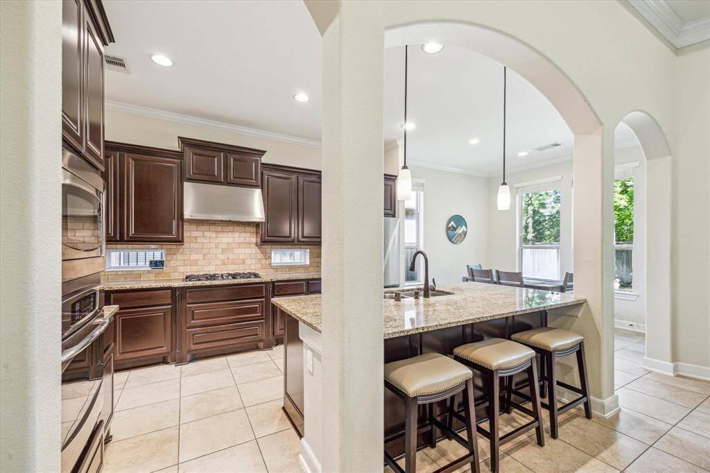 Kitchen is Open to the Family Room and Breakfast Room.