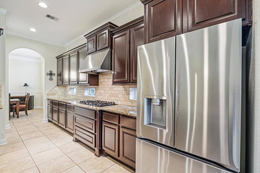 Look at All of the Cabinets and Counter Space * Stainless Steel Refrigerator is Approximately 1 Year Old and Will Stay * Gas Cooking.