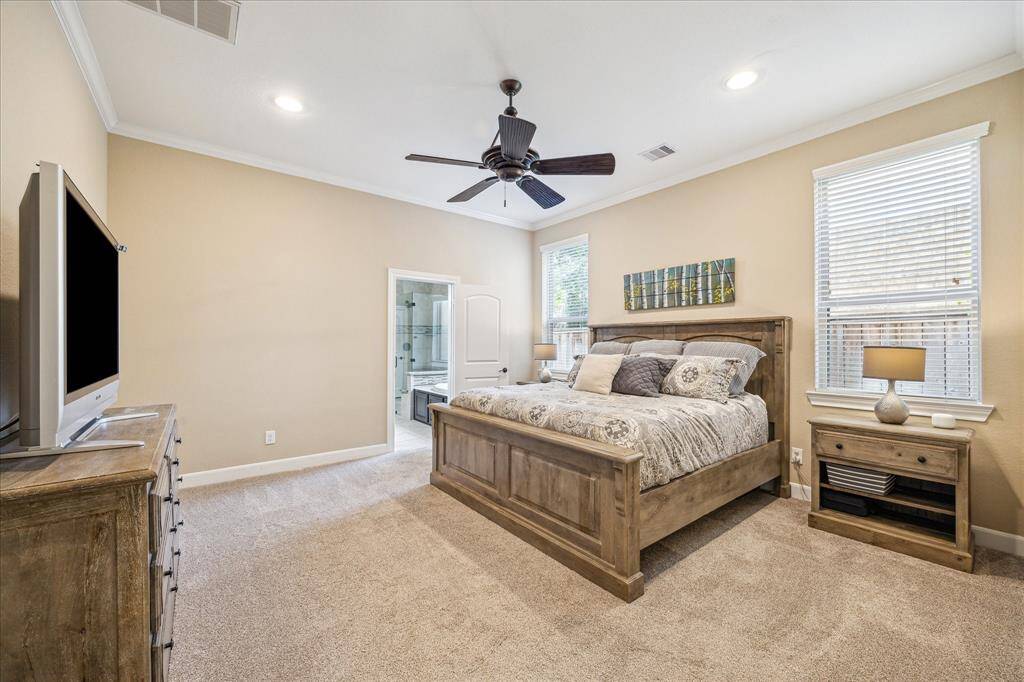Downstairs Primary Bedroom * Neutral Carpet is Approximately 2 Years Old * Recessed Lighting * Decorative Ceiling Fan.