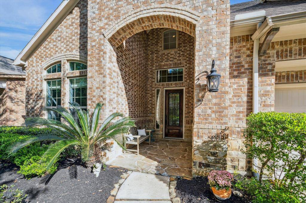 Stunning Architectural Curb Appeal * Grand Entry with Lots of Interest * Mature Landscaping.