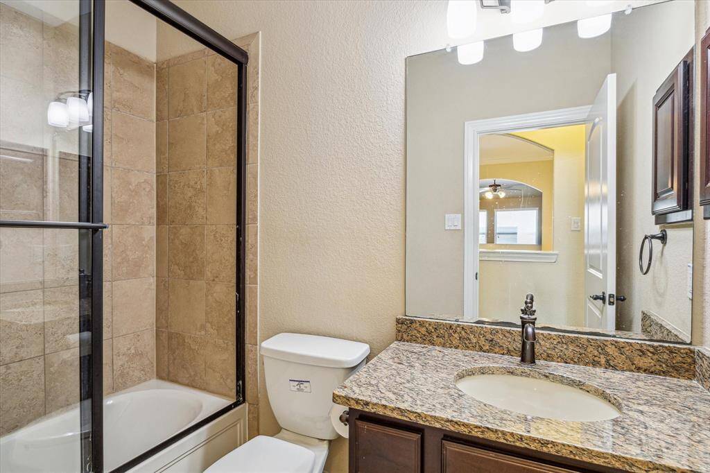 Bathroom that is in the Hallway * Tub with Shower * Granite Countertop * One of Two Full Bathrooms that are UPSTAIRS.