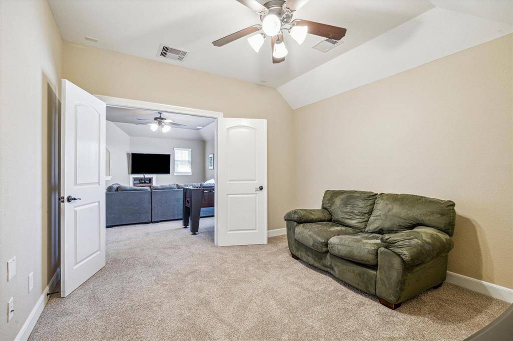 The Upstairs Media Room * NO Windows and Double Doors Close to Make it a True Media Room * This Flexible Floorplan Can Also Be a Den Or a Playroom Or a Craft Room or an Exercise Room * So MANY Options with this Space.