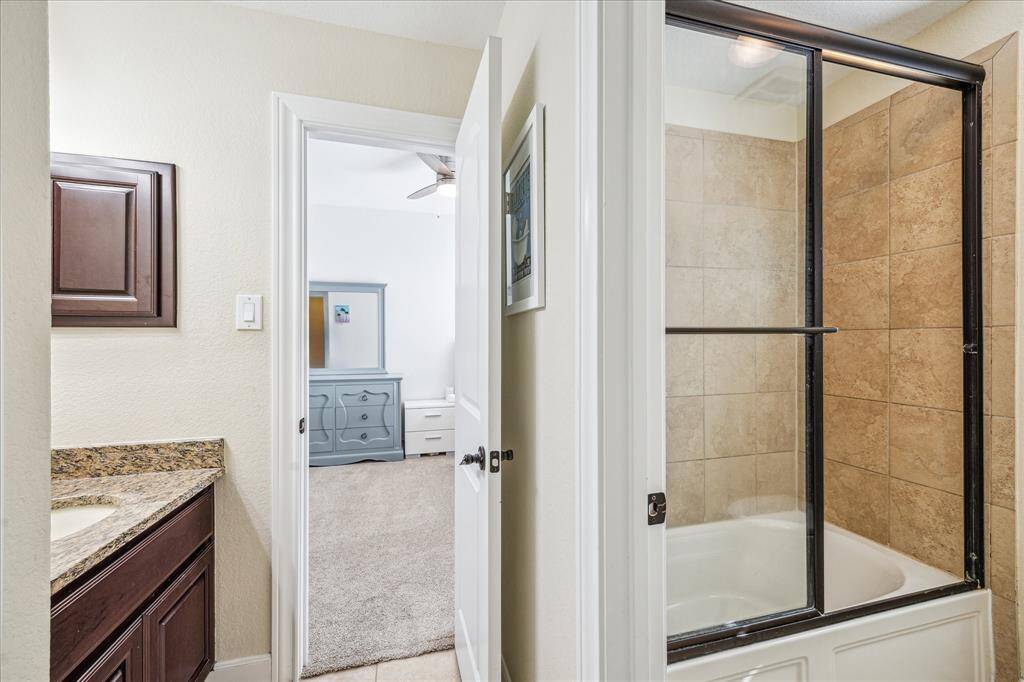 Bathroom That is in Between Two Bedrooms.