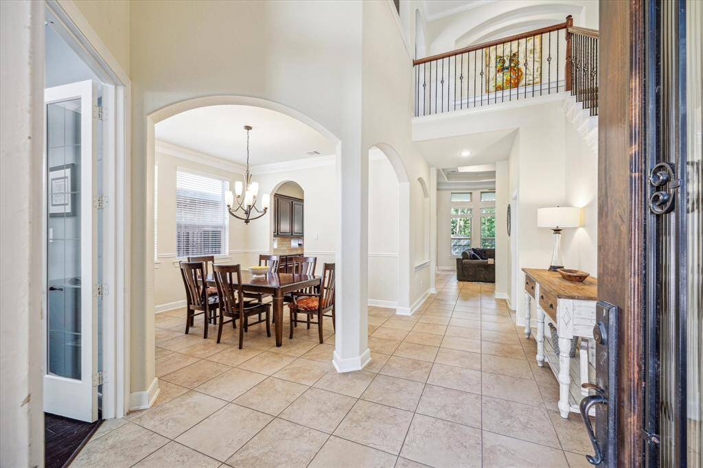 Spacious Entry with Arches and High Ceilings * Neutral Floors Throughout.