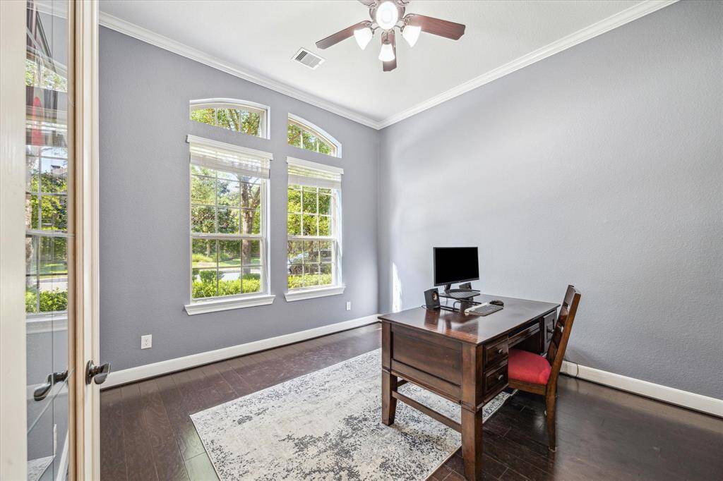 Downstairs Study * Neutral Colors * Big Windows with Natural Light * Faces the Front of the Home.