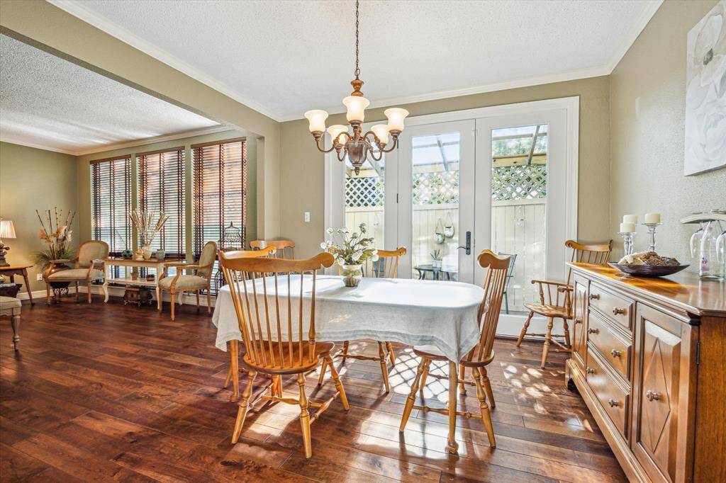 From the dining room, you also have access to the covered patio! Perfect for a cup of coffee in the mornings or a glass of wine in the evenings.