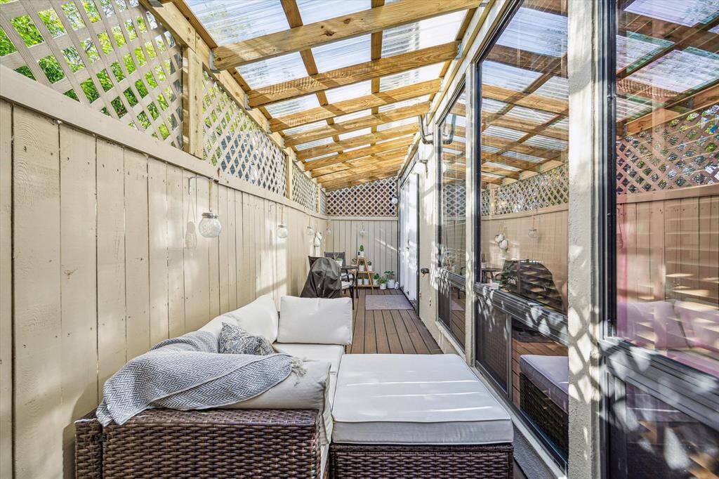 The covered patio is the perfect outdoor escape! Maximizing privacy and functionality, you are covered from rain and wind. *Trex flooring was added in 2022. *per seller