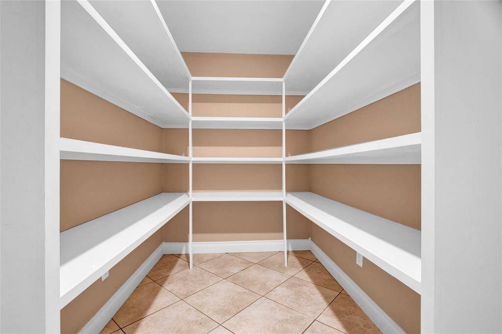 Storage Space/Additional Pantry through Laundry Room