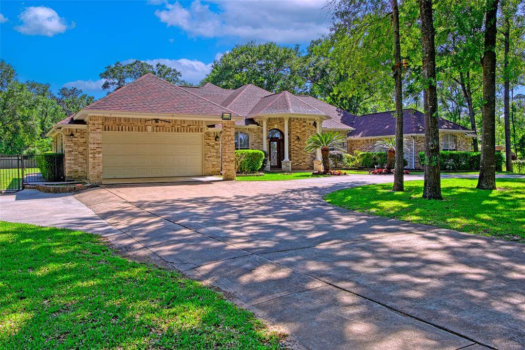 U-Shape driveway provides dual access from the street and leads directly to the garage.